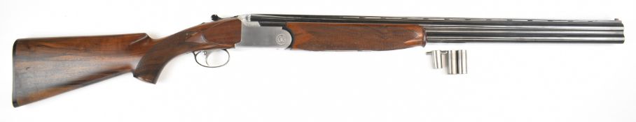 Gamba 12 bore over and under ejector shotgun with engraved underside and thumb lever, chequered