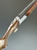 Browning Medallist Sporter 12 bore over and under ejector shotgun with named and ornately engraved