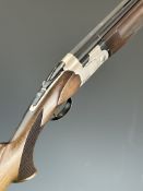 ATA SP Sporter 12 bore over and under ejector shotgun with chequered semi-pistol grip and forend,