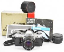 Canon AE-1 35mm SLR camera with Canon FD 50mm 1:1.8 and 135mm 1:2.8 lenses, Soligor teleconverter,