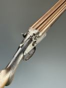 Thomas Wild 12 bore side by side hammer action shotgun with named and engraved locks, engraved