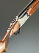 Winchester 101 XTR Lightweight 12 bore over and under ejector shotgun with engraved scenes of