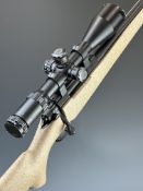 Nosler M48 .223 bolt-action rifle with composite stock, semi-pistol grip, raised cheek piece,