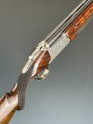 Nikko Model 812 12 bore over and under ejector shotgun with engraved action, underside, trigger