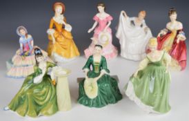Eight Royal Doulton figures including Daydreams, Amy and Southern Belle, tallest 23cm