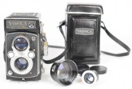 Yashica Mat-124 G TLR camera with Yashinon f=80mm 1:3.5 lens together with telephoto attachment, all