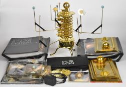 Gilt metal / brass revolving planet orrery clock depicting the solar system, H37cm