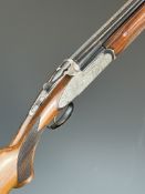 Fias 12 bore over and under ejector shotgun with engraved scenes of birds to the sidelock plates and