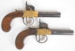 A pair of William Hole of Bristol percussion hammer action pocket pistols each with named and