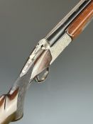 Nikko Model 5000 II 12 bore over and under ejector shotgun with engraved locks, trigger guard,