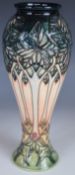 Moorcroft vase decorated in the Cluny pattern, H27cm