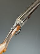 English 12 bore side by side shotgun with engraved locks, underside, trigger guard, top plate, thumb