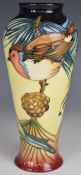 Moorcroft vase decorated with birds in the Inglewood pattern, dated 2002 to base, H21cm