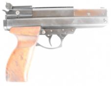 BSA 40 Magnum .177 air pistol with shaped wooden grips and adjustable sights, serial number AP06553.