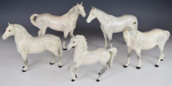 Six Beswick grey colourway horses including Welsh cob, tallest 26cm