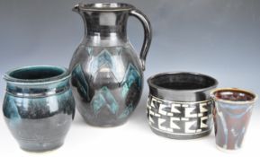 Four studio pottery vases, jug and jardinière with various initials including GL and CW etc, tallest