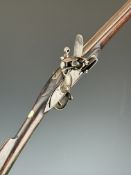 Flintlock sporting gun with lock stamped 'Warranted' and engraved with an elephant, carved