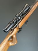 Anschutz Model 1417 .22 bolt-action rifle with chequered thumb-hole grip and forend, raised cheek