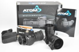 Atom digital night vision rifle scope, in original box with accessories and instructions.