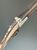 Gunmark Kestrel 12 bore side by side shotgun with named and engraved locks, engraved underside,