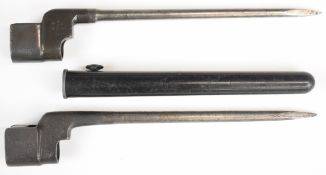 Two British No4 MkII spike bayonets, one in plastic scabbard, the other with SM maker's mark,