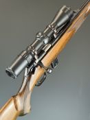 Mauser 201 .22 bolt-action rifle with chequered semi-pistol grip and forend, adjustable sights and
