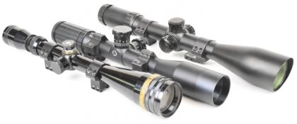 Three various rifle scopes comprising Tasco 24x44, one Fox style and one other.