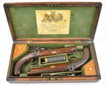 A pair of John Manton & Son of London 28 bore percussion hammer action duelling pistols each with