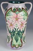 Moorcroft twin handled pedestal vase decorated in the Blakeney pattern, dated 2001 to base, H26cm