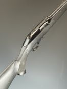 Marlin 7000 .22 semi-automatic rifle with composite stock, textured semi-pistol grip and forend,