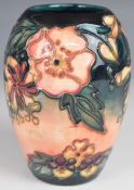 Moorcroft vase decorated in the Oberon pattern, dated 93, H14cm