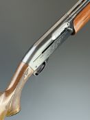 Remington Model 1100 12 bore 5-shot semi-automatic FAC shotgun with ornately carved and chequered