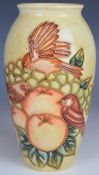 Moorcroft vase decorated in the Finches and Fruit pattern, H19cm