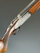 Rizzini 12 bore over and under ejector shotgun with engraved scenes of birds to the sidelock
