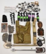 A collection of gun and shooting related items including shooting stick/ seat, military vest and
