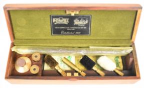 William Powell shotgun cleaning kit with named oil bottle and snapcaps, in fitted wooden case.