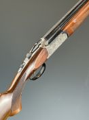 Fias 20 bore over under ejector shotgun with engraved locks, underside, trigger guard, top plate,