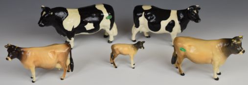 Beswick Jersey and Friesian bull, cow and calf figures