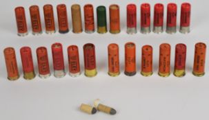 Twenty seven collector's shotgun cartridges including 7 cutaway examples, two Kynoch needlefire etc,