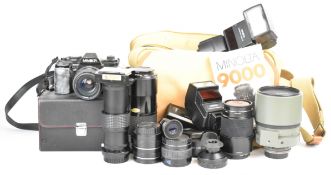 Minolta 9000 35mm SLR camera and lenses comprising 24mm 1:2.8, 50mm 1:1.7, 35-105mm 1:3.5-4.5, Macro