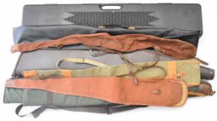 Eight shotgun or rifle slips/ cases including Brady of Halesowen and a hard cased example with