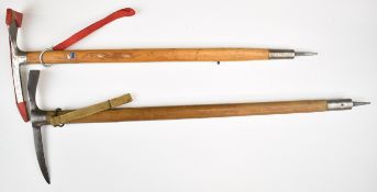 Two ice axes, one WW2 stamped Brades 1943 and with broad arrow to head and wooden shaft, overall