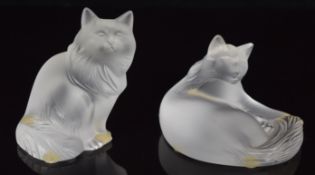 Two Lalique frosted glass cats, each signed 'Lalique France', one with original label, largest 8.5cm