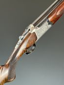 Miroku 12 bore over and under ejector shotgun with engraved lock, underside, trigger guard and thumb