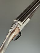 E J Churchill 12 bore side by side ejector shotgun with named and engraved locks, engraved