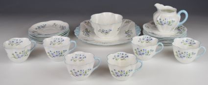 Shelley tea ware decorated in the Blue Rock pattern including six trios, 21 pieces.