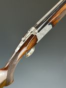 Browning Medallist Sporter 12 bore over and under ejector shotgun with named and ornately engraved
