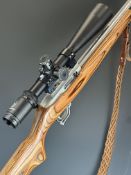 Ruger Model 10/22 .22 semi-automatic rifle with laminated show wood stock, semi-pistol grip,