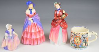 Three Royal Doulton figurines including A Victorian Lady HN728 and Rowena HW2077 and a commemorative