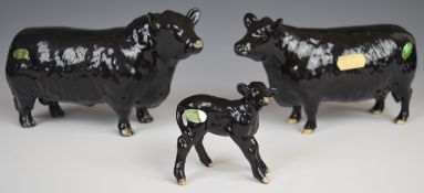 Beswick Aberdeen Angus Society approved bull, cow and calf figures, tallest 12cm